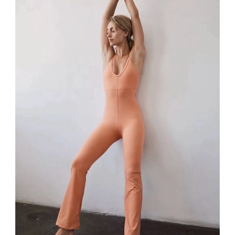 Women's Free People All Star Jumpsuit in Peach Pit sz XS Athleisure Yoga Lounge